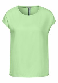 Top verde a maniche corte realizzato in tessuto liscio, con scollatura rotonda, vestibilità rilassata e dettagli delle cuciture sottili lungo le spalle.