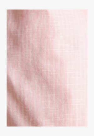 Light pink fabric with a subtle checkered pattern, featuring thin white lines. The texture appears smooth and slightly wrinkled.