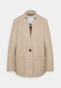 Abrigo beige de mezcla de lana con cuello mandarín, cierre de un solo botón, dos bolsillos delanteros y ajuste holgado. Diseñado con detalles de costuras.