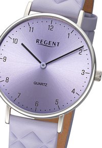 Quartz watch with a lavender gradient dial, silver-tone hands, and black markers. Features a purple textured silicone strap and simple metal case.
