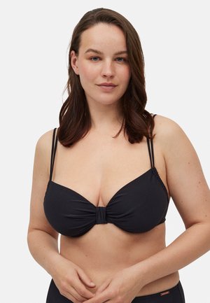 Top de bikini negro con un diseño de frente torcido, tirantes delgados ajustables y textura suave. Sin herrajes visibles, adecuado para traje de baño.