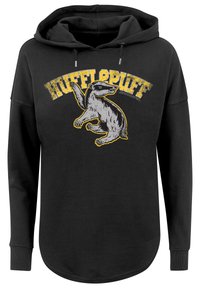 Felpa nera con cappuccio caratterizzata da una grafica di un tasso con il testo "HUFFLEPUFF" in giallo sopra. Progettata con una vestibilità rilassata e maniche lunghe.