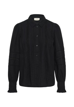 Blouse noire à manches longues avec des boutons sur le devant, des pincements et des détails en dentelle, des épaules bouffantes et des poignets froncés.