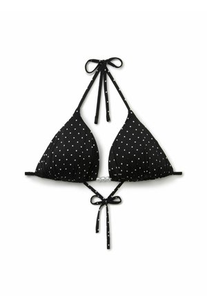 Top de bikini negro con lunares blancos, cuello halter y tiras delanteras para atar la espalda, mostrado plano sobre un fondo blanco.