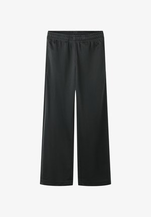 Zwarte wijde broek met elastische tailleband en zijzakken, plat getoond tegen een witte achtergrond.