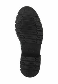 La suela de goma negra presenta un patrón de huella texturizado con surcos profundos para mayor tracción. El nombre de la marca "S. OLIVER" está grabado en el costado.
