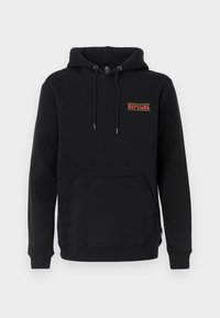 Zwarte hoodie met een voorzak, een capuchon met trekkoord en een geborduurd 'RIP CURL' logo in rood en geel. Zacht materiaal, geribde manchetten.