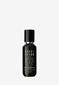 Svart glassflaske med gulltekst. Har avrundede skuldre og en sylinderformet hette. Etiketten leser "Bobbi Brown Intensive Serum Foundation SPF 40."