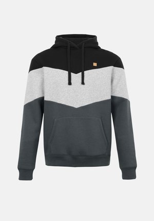 Kapucnis pulóver fekete, világosszürke és sötétszürke halszálka mintás színblokkokkal, húzózsinórokkal, első zsebbel és egy kis világosbarna négyzet alakú logóval a mellkason.