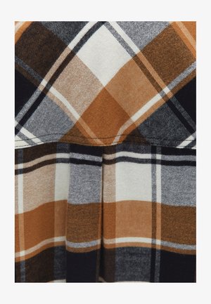 Karierte Stoff in Orange, Braun, Marineblau und Weiß. Verfügt über ein Gittermuster und eine weiche Textur, mit horizontalen und vertikalen Linien, die Quadrate bilden.