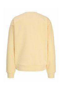 Gul genser med lange ermer, rund hals og ribbet kant. Myk tekstur med en glatt finish og uten synlige mønstre eller utsmykninger.