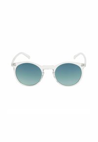 Gafas de sol redondas con montura de plástico transparente y lentes degradados azules, con bordes suaves y patas flexibles.