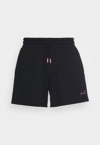 Pantalones cortos de algodón negros con cintura elástica, cordón en rosa y un pequeño logo rosa en el dobladillo inferior.