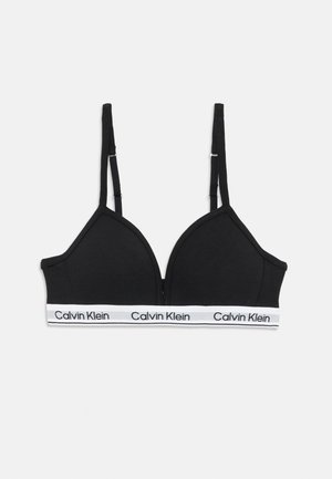 Black cotton bralette with a triangular shape, thin adjustable straps, and a white band featuring “Calvin Klein” logo.