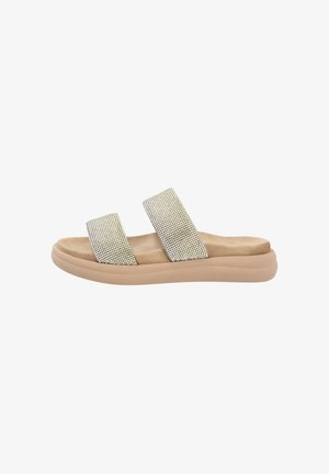 Sandalias de deslizamiento con dos correas anchas hechas de rhinestones metálicos, plantilla suave en beige y una suela de goma en un tono beige claro.