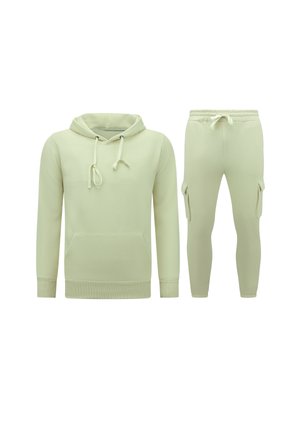 Lichtgroene hoodie met voorzak en koordjes, gecombineerd met bijpassende slim-fit joggingsbroek met zijvakken en een koord in de taille.
