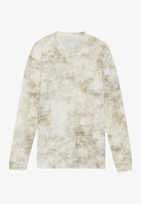 Koszula z długim rękawem w jasnym beżu z wzorem tie-dye w ciemniejszych odcieniach. Posiada okrągły dekolt i małe logo na piersi. Miękka tekstura.