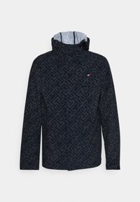 Námořnická bunda se světle šedým geometrickým vzorem, s kapucí, stahovacími šňůrkami a malým logem na hrudi. Hladká textura látky.