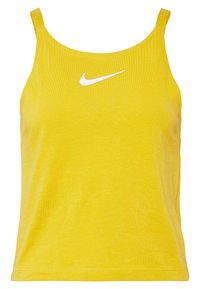 Gul bomullstopp med tunna axelband och rund halsringning. Har en vit Nike-logotyp på bröstet. Slät textur, normal passform.