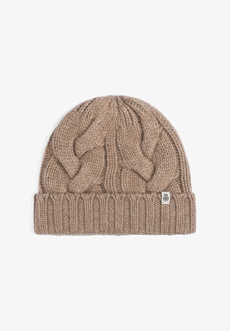 Beige knitted beanie with a textured cable pattern on the main body and ribbed cuff, featuring a small branded label on the side.