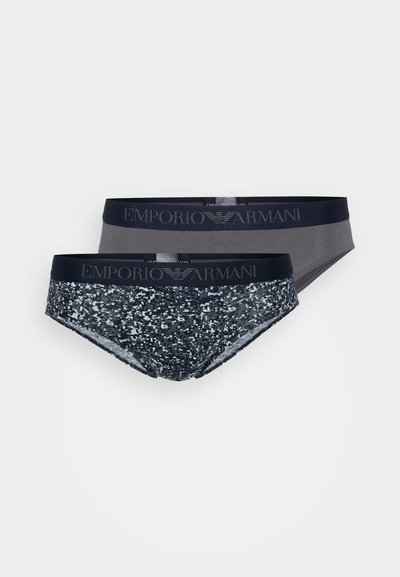 Two pairs of Emporio Armani briefs with a dark gray pair and a navy pair featuring a sequined pattern. Logo-accented elastic waistbands.