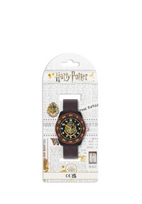 Montre Harry Potter avec un bracelet noir ornée de détails rouges, un cadran noir rond, des chiffres jaunes et l'emblème de Gryffondor sur le cadran.
