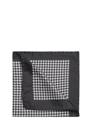 Fazzoletto da taschino in seta bianco e nero con un motivo geometrico, caratterizzato da un bordo testurizzato e una finitura satinata liscia.