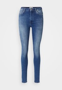Jeans ajustados en denim azul medio con un acabado descolorido. Presenta un diseño clásico de cinco bolsillos y una cintura de altura media.