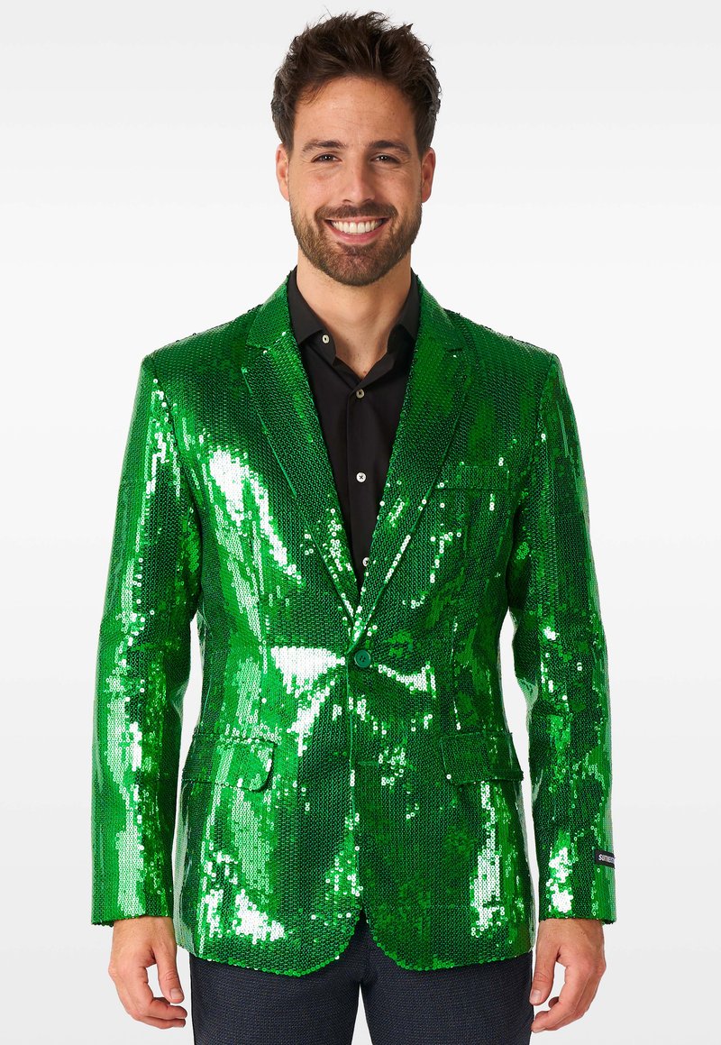 Blazer verde con paillettes, colletto a revers, chiusura con un bottone e due tasche frontali, con una superficie lucida e texture.