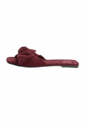 Flache burgunderfarbene Wildleder-Pantolette mit einem geknoteten Schleifendetail am Obermaterial und einer schwarzen Gummisohle.