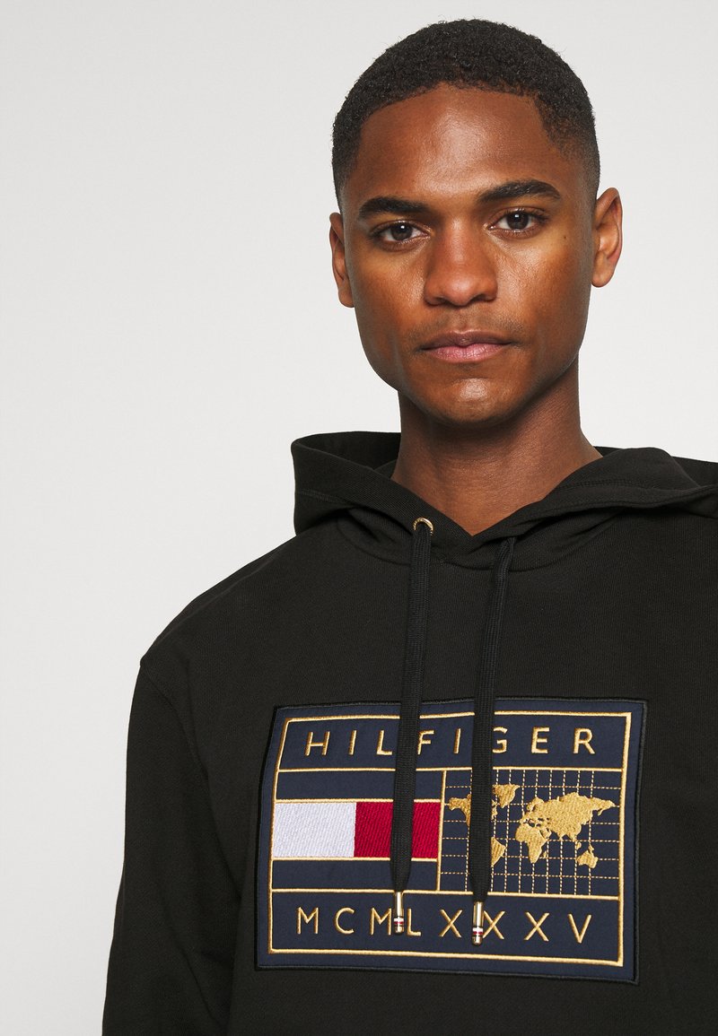 icon earth badge hoodie