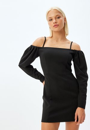 Schwarzes Minikleid mit schulterfreiem Design, langen Puffärmeln und taillierter Silhouette. Hergestellt aus glattem, dehnbarem Stoff.