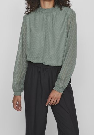 Bluse - mottled green