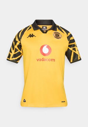 Žuti dres za nogomet s kratkim rukavima s crnim detaljima i jedinstvenim uzorkom na rukavima. Sadrži logotipe i ovratnik. Lagani materijal.