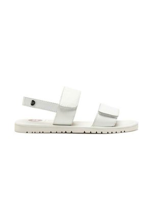 Sandali bianchi con due cinturini regolabili in Velcro. Suola piatta con un motivo di grip testurizzato. Design leggero ideale per l'uso quotidiano.