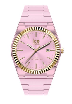 Orologio da polso analogico rosa con lunetta scanalata dorata, indici e lancette dorate, datario e cinturino rosa a maglie.