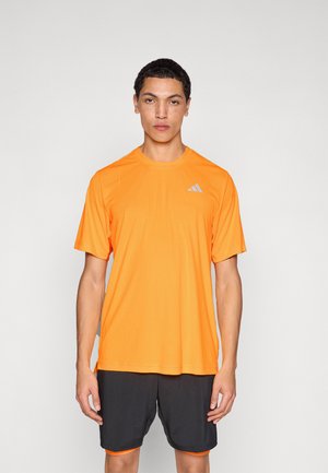 CLUB TEE - T-shirt till träning - lucid tangerine