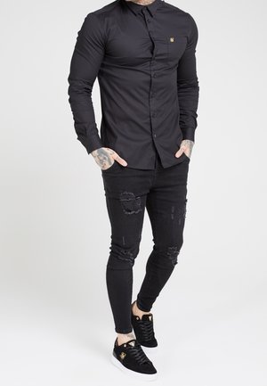 Vapaa-ajan kauluspaita - black