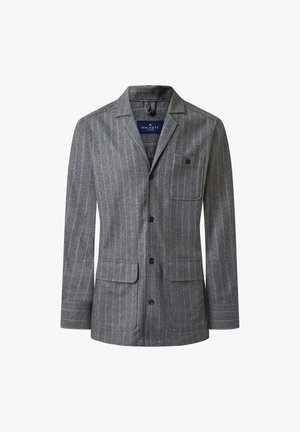 Blazer gris a rayas con un bolsillo en el pecho, solapa muescada y cuatro botones frontales. Fabricado en un tejido texturizado.