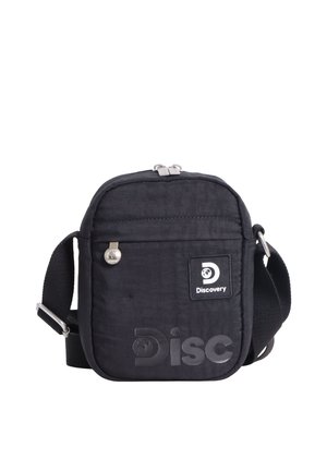 Schwarze kompakte Schultertasche mit verstellbarem Riemen, vordere Reißverschlusstasche, geprägtem "Disc"-Schriftzug und "Discovery"-Logoaufnäher auf der Vorderseite.