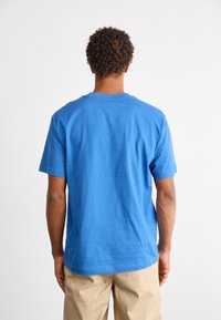 New Balance ESSENTIALS - T-shirt basic - blue agate