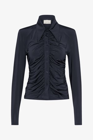Navy long-sleeve blouse made of smooth fabric with a fitted silhouette, featuring ruched detailing down the front and a pointed collar.