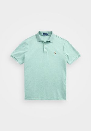 Polo de cor verde menta feito de algodão texturizado, com uma pala de três botões, mangas curtas e um pequeno logótipo bordado no peito.