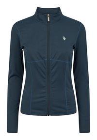 Donkerblauwe ritsjack met lange mouwen. Het jack heeft contrasterende lichtblauwe stiksels en een klein logo op de borst. Het materiaal lijkt glad te zijn.