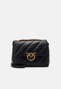 Black quilted leather handbag with a gold chain strap and bird motif hardware, featuring a flap closure and a textured surface.