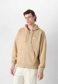 HUGO NARDIMEZ - Sweat zippé - medium beige