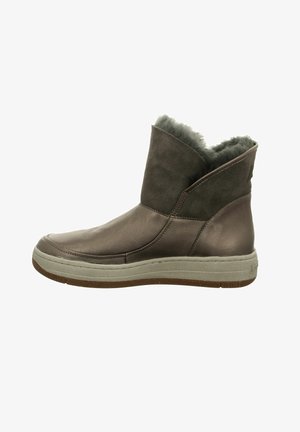 Brown leather ankle boots with soft gray fur lining, slip-on design, rubber sole, and contrasting tan accents on the bottom.