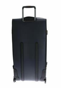 Valise rigide navy avec une poignée rétractable, texture lisse, deux coutures verticales et quatre roues pivotantes pour la mobilité.