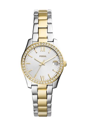 Two-tone silver and gold Fossil watch with crystal bezel, white dial, gold Roman numerals, and date window showing 18.