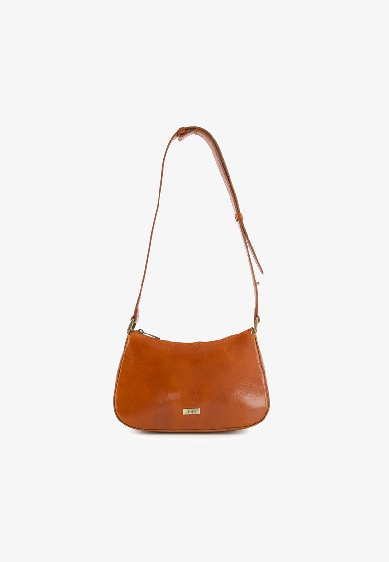Tan leather shoulder bag with a curved shape, adjustable strap, and a small, gold logo accent. Features a zip closure.